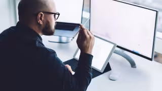 Finance Chiefs Own Both AI Cost and AI Trust, Deloitte Survey Finds